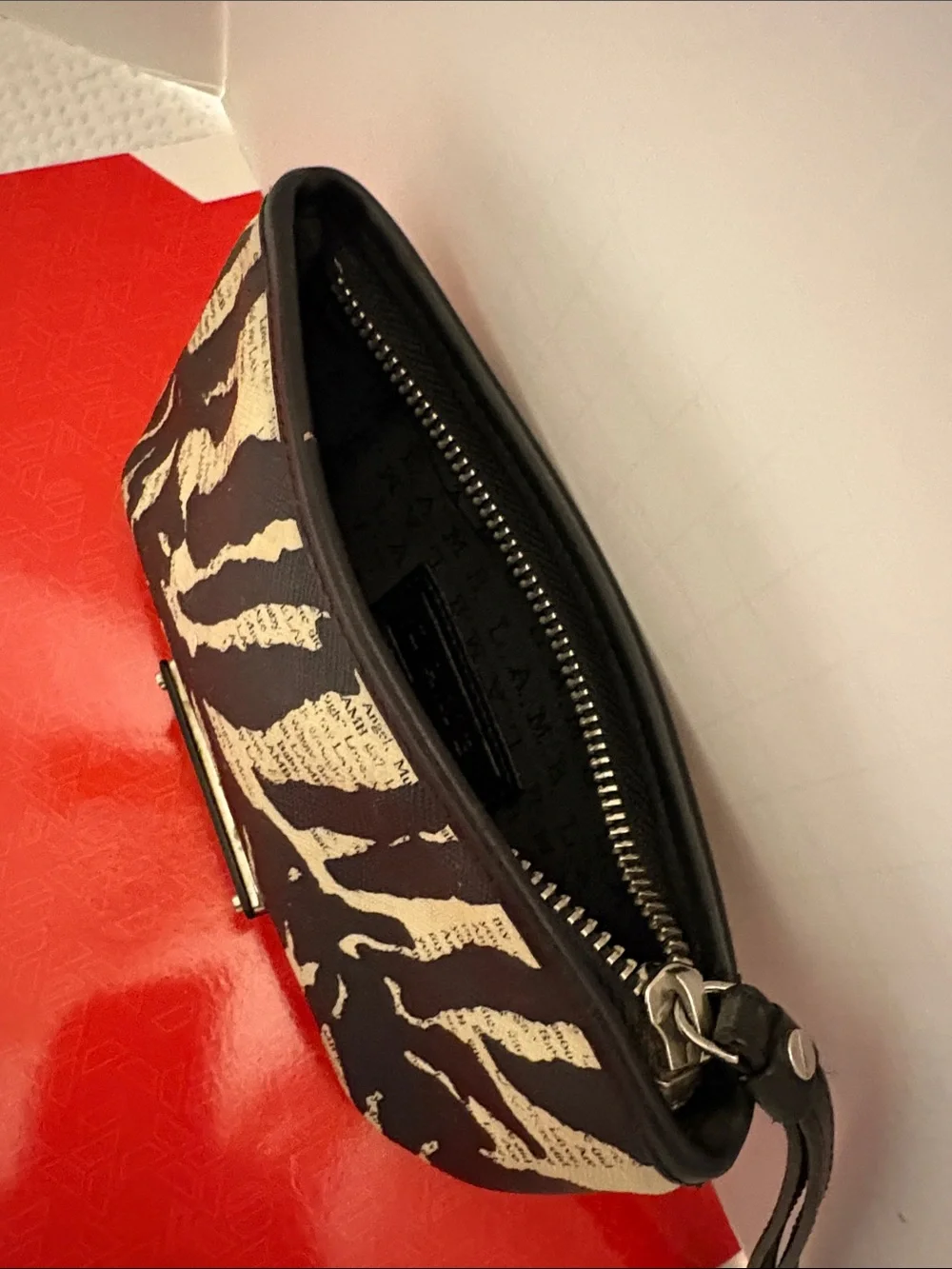 L.A.M.B. Black and Cream Zebra-Print Clutch with Logo Plate